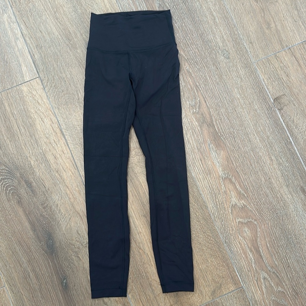 Lululemon women's long leg yoga pants. Size 2. Color Black.